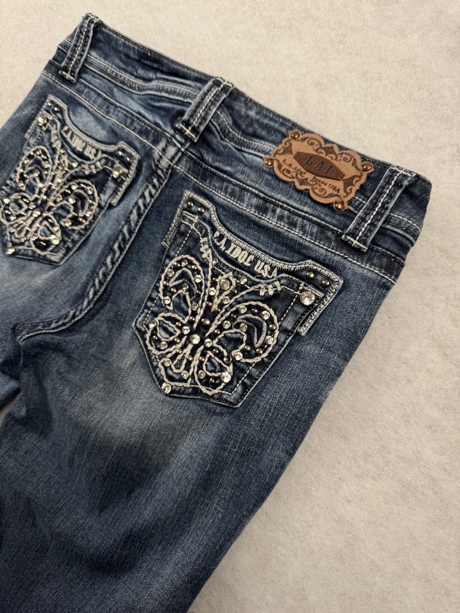 La Idol Boot Cut Low Waist Jeans 26