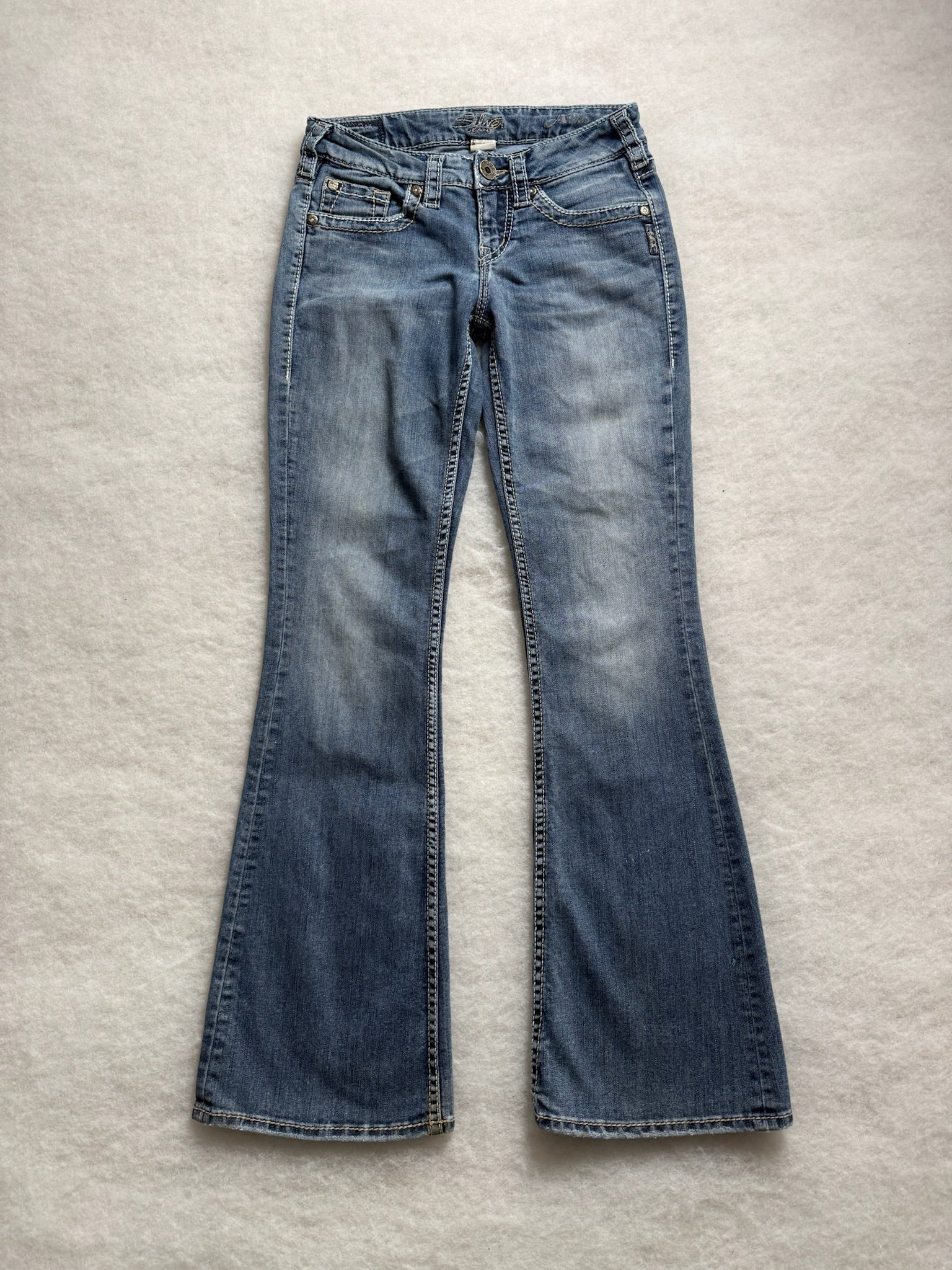 Silver Boot Cut Low Waist Jeans 25