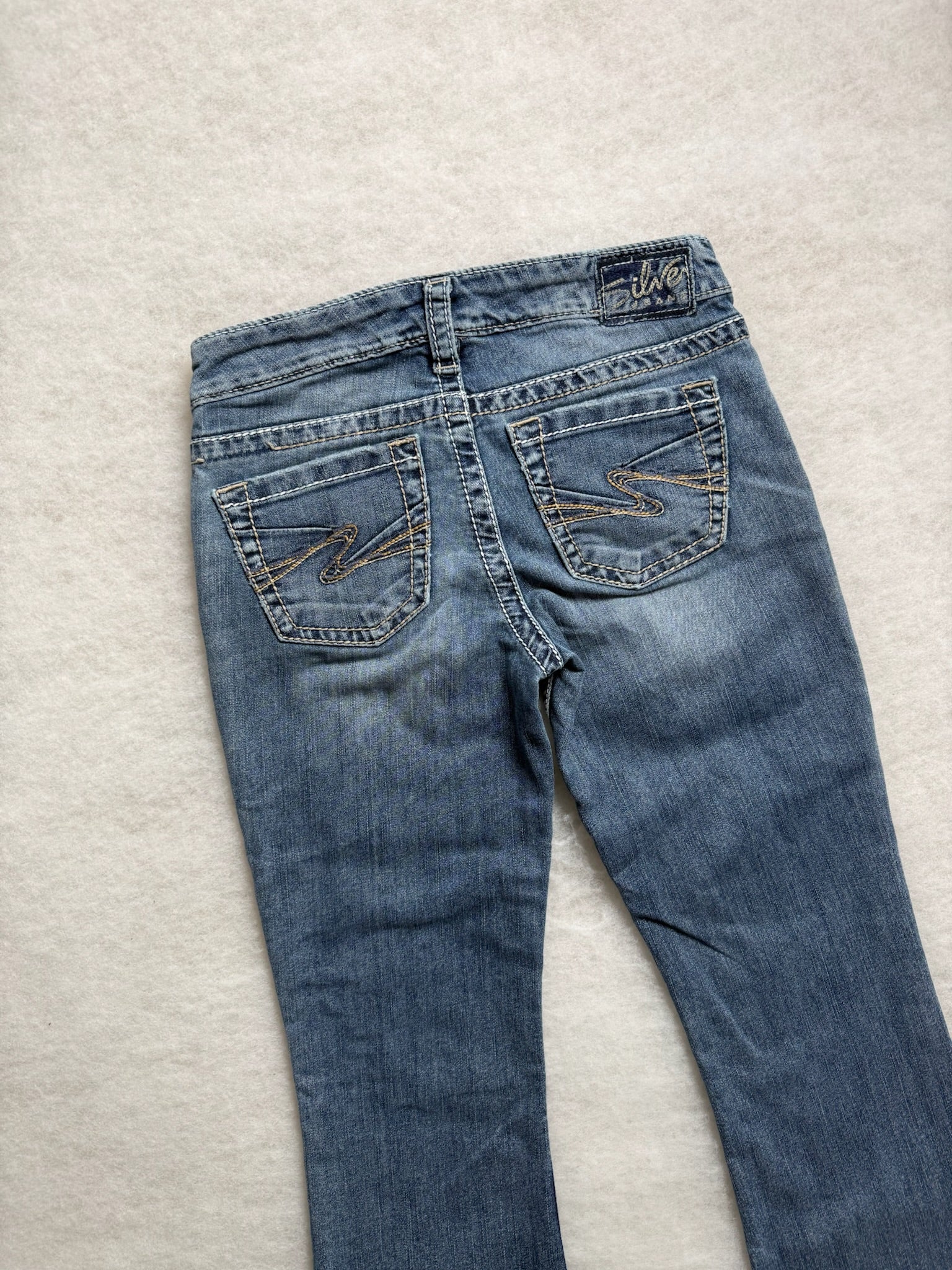 Silver Boot Cut Low Waist Jeans 25