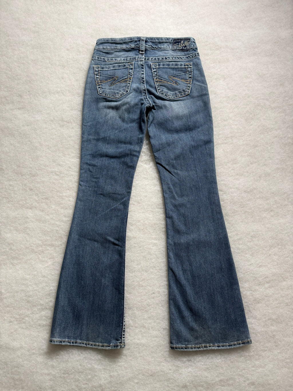 Silver Boot Cut Low Waist Jeans 25