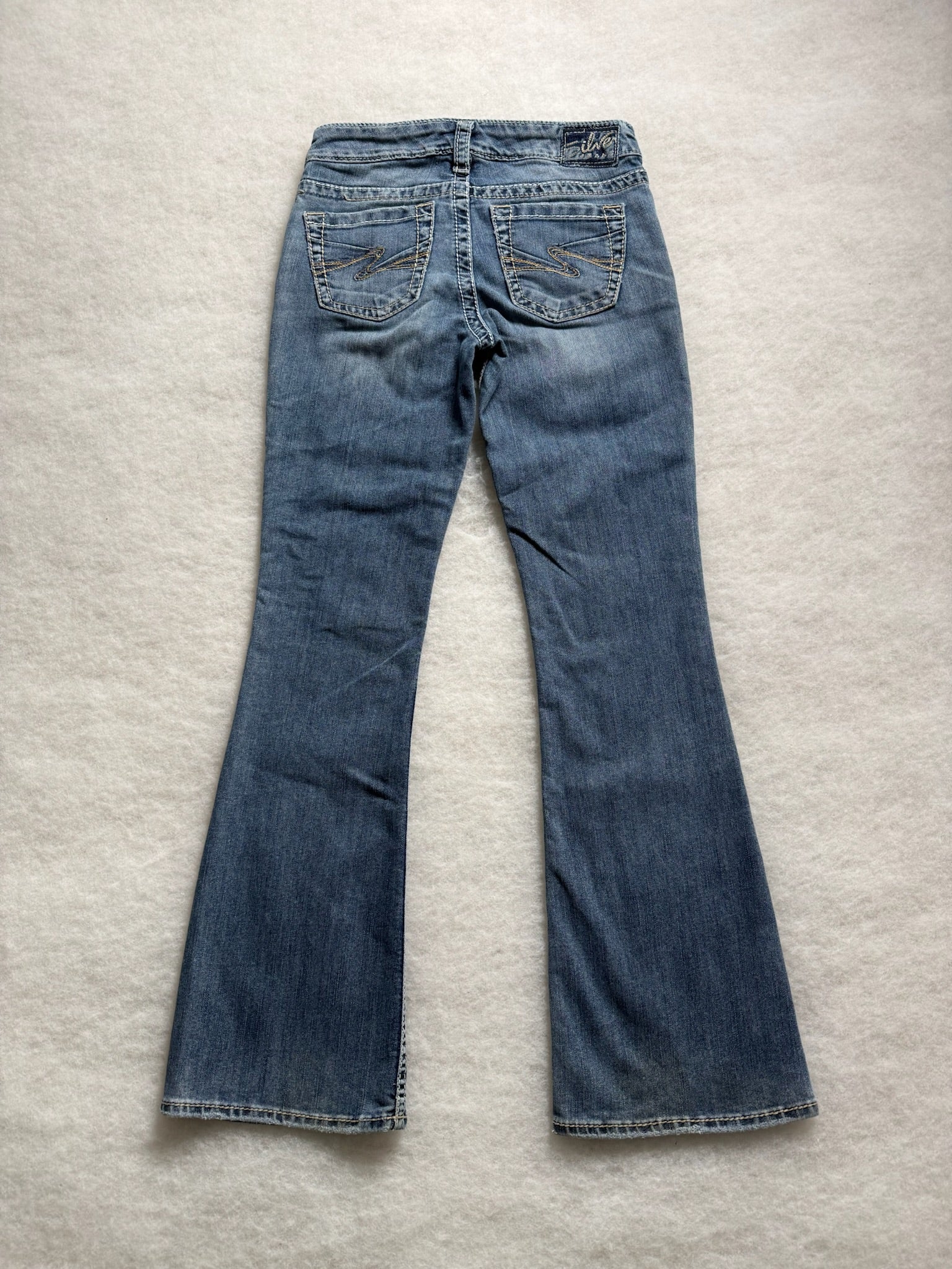 Silver Boot Cut Low Waist Jeans 25