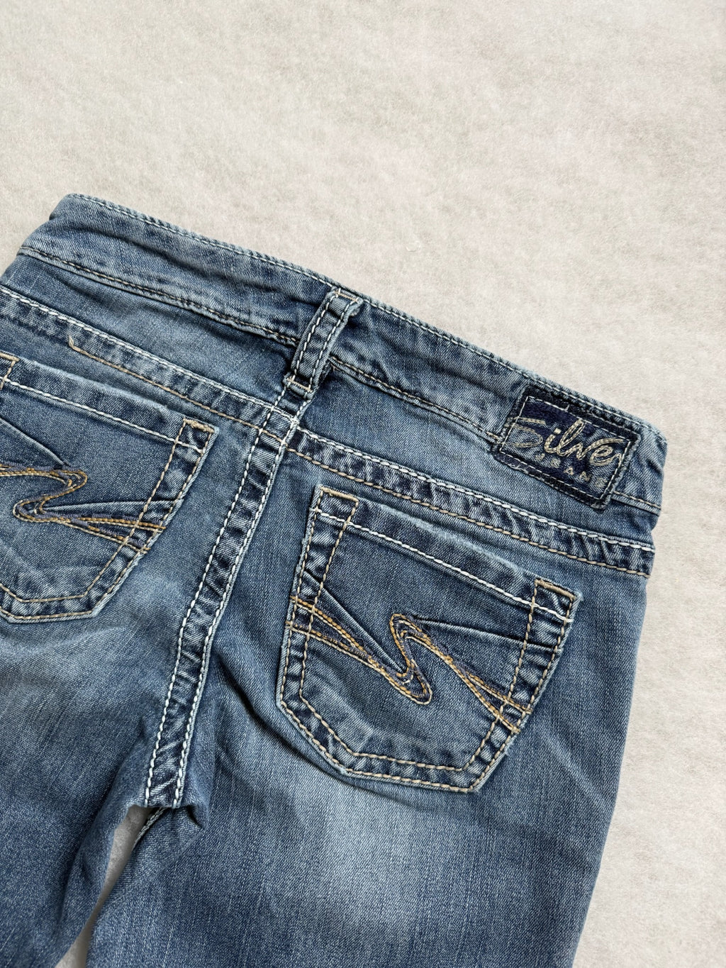 Silver Boot Cut Low Waist Jeans 25