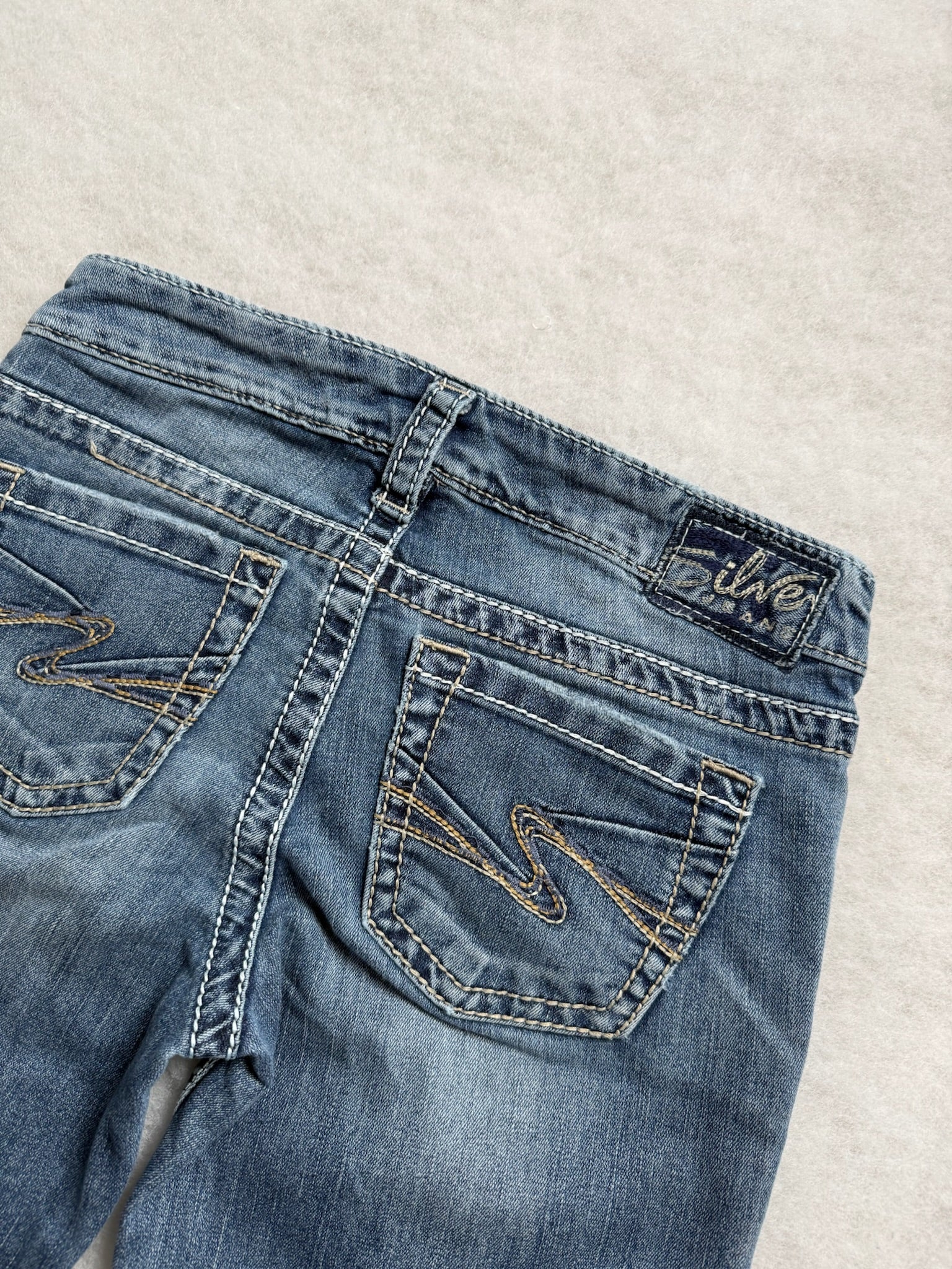 Silver Boot Cut Low Waist Jeans 25